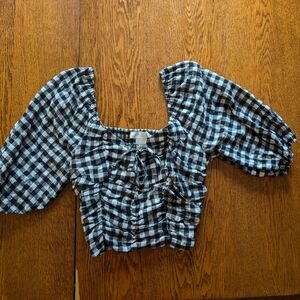 Cropped black and white gingham puff sleeve top with tie front